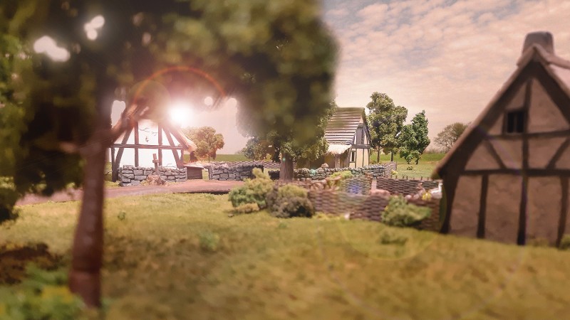 Blick nach Osten auf das namenlose Gehöft, auf das es die Frankfurter abgesehen haben. Noch liegt am Morgen tiefer Frieden über dem Hof - ein Frieden, der durch die bevorstehenden Fehdehandlungen empfindlich gestört werden wird. Denn meist sind es die Bauern, die unter Verwüstungen, Plünderungen und Brandstiftungen leiden. Doch weder hier noch in den umliegenden Gefilden sind Bauern zu sehen - ein Umstand, der die Frankfurter frühzeitig hätte stutzig machen sollen. Alles deutet darauf hin, dass die Bevölkerung gewarnt ist und das Aufgebot Gefahr läuft, abgefangen zu werden - genau so, wie es kurz darauf tatsächlich geschehen wird.